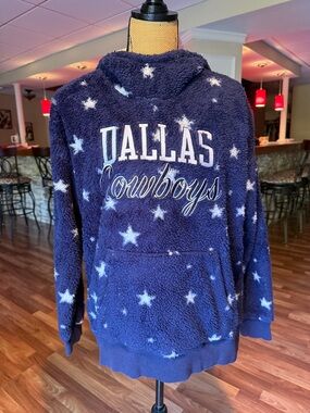 Dallas Cowboys size medium fleece hoodie with stars all over and kangaroo pocket